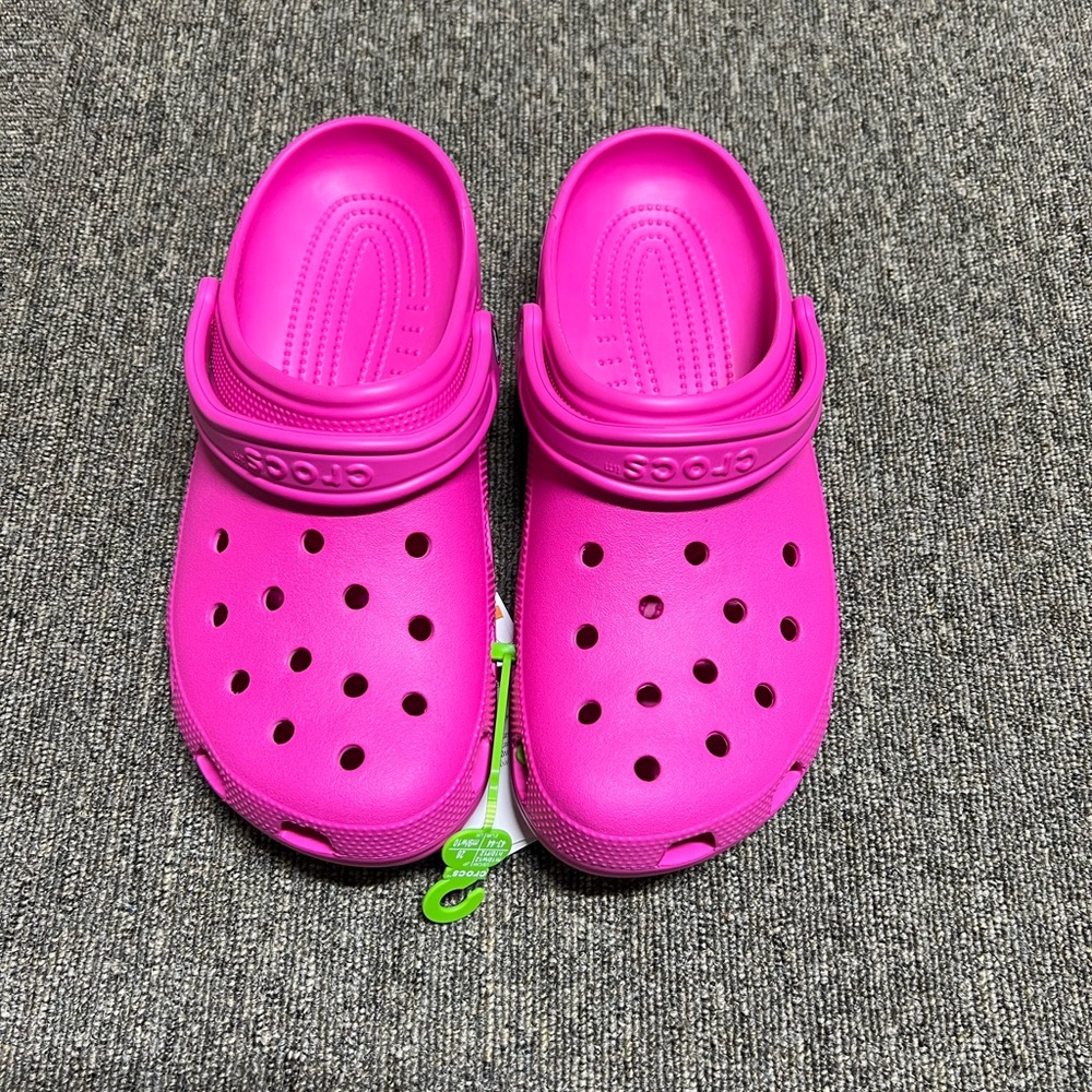 CROCS MENS PINK SIZE 10 or WOMEN’S SIZE 12